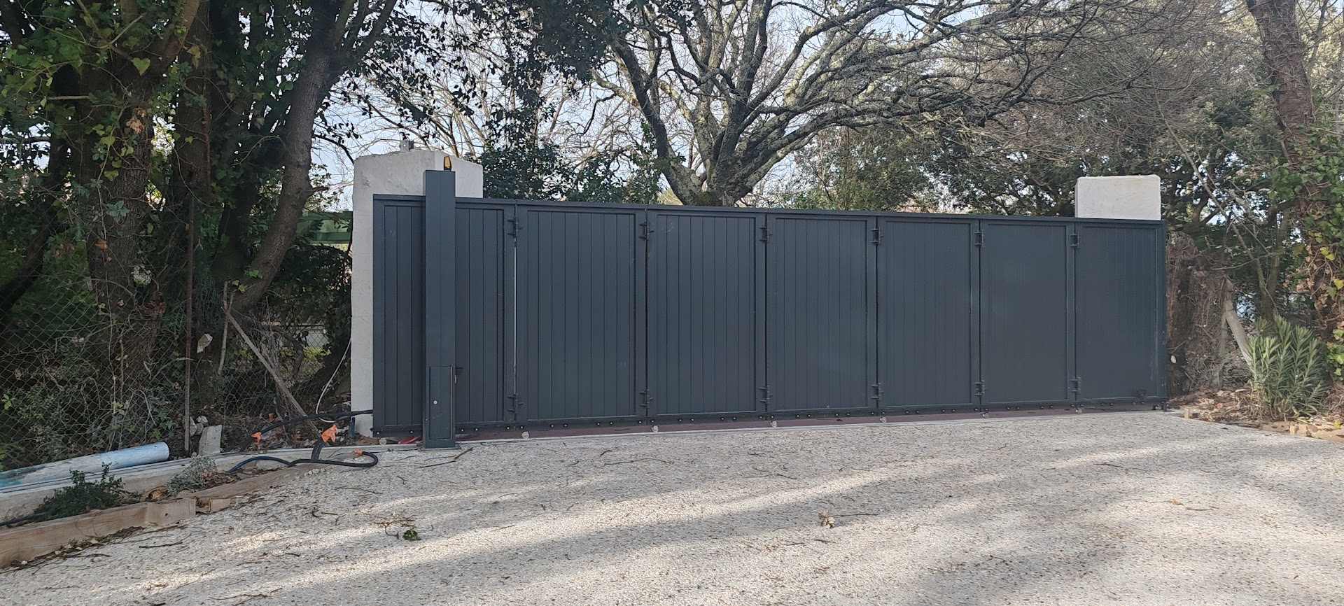 Portail coulissant sectionnel